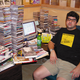 Dana Harris spends a Friday night cataloging his CD collection on a computer spreadsheet.
